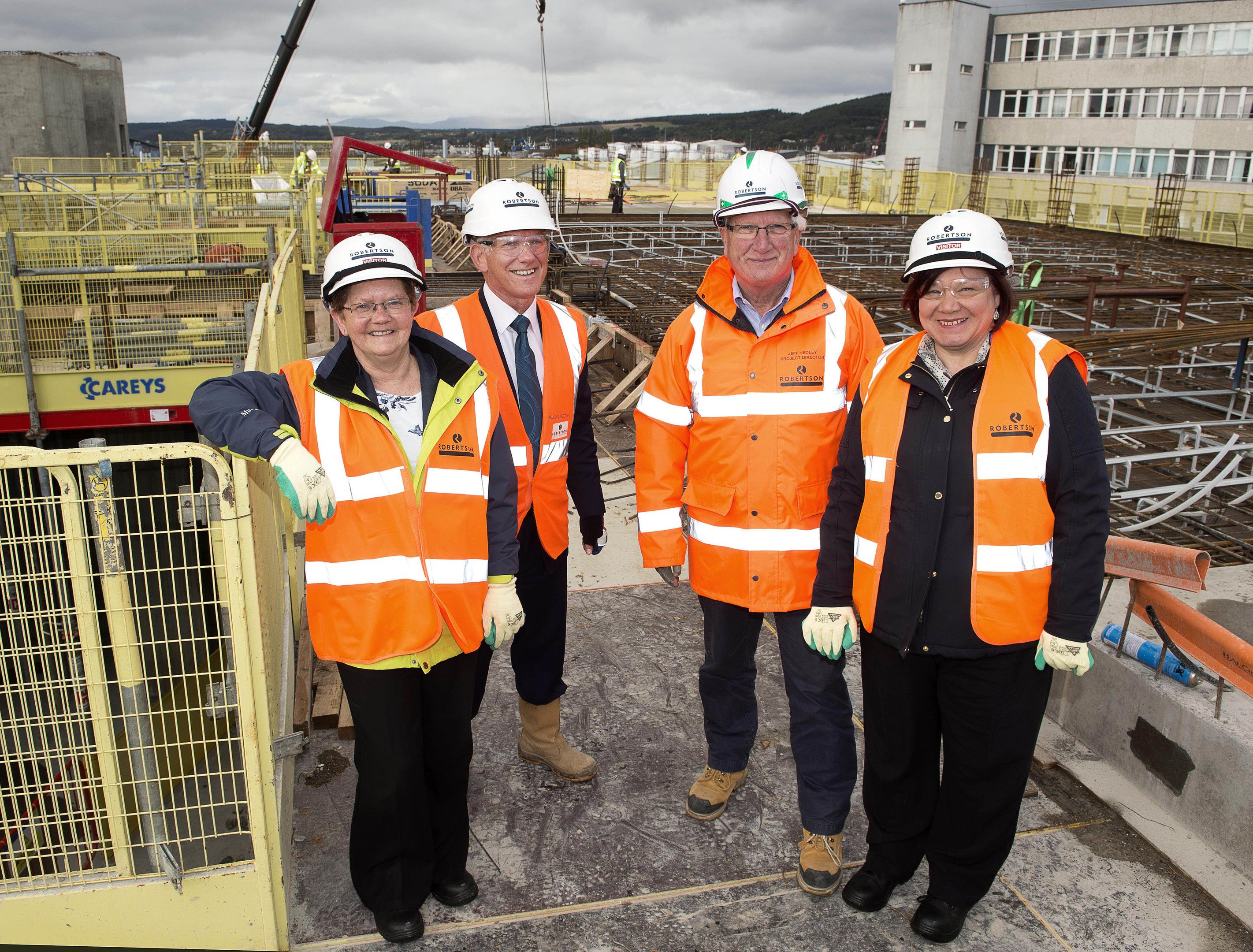 Margaret Reid of Scottish Courts and Tribunal Service,
Frank Reid and
Jeff Hedley, both of Robertson Construction, and Nikki Burnel, also of Scottish Courts and Tribunal Service, at the site of Inverness' new Justice Centre