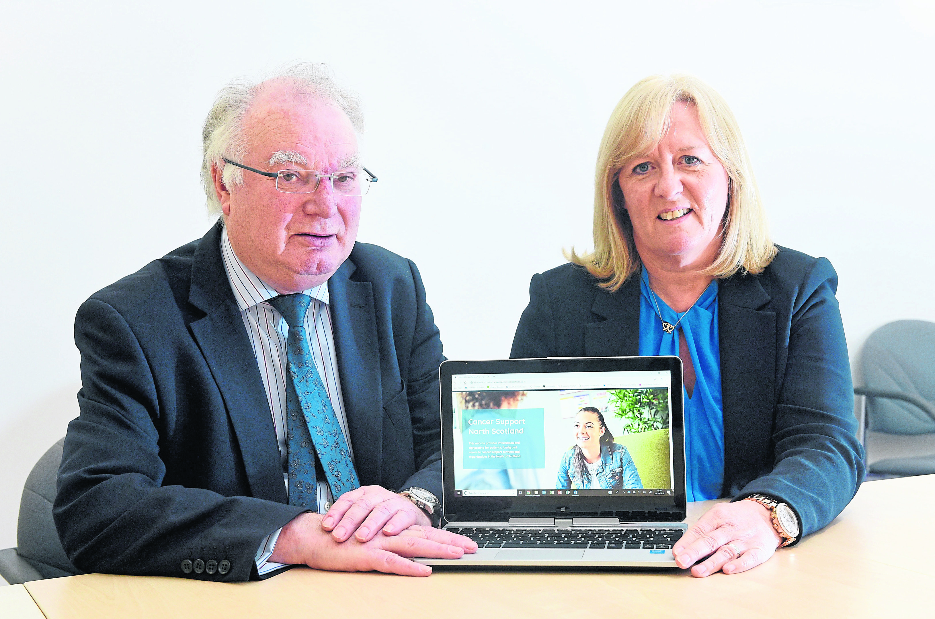 Professor Stephen Logan and Dr Colette Backwell at the launch of an online cancer resource at Clan Cancer Support, Aberdeen.