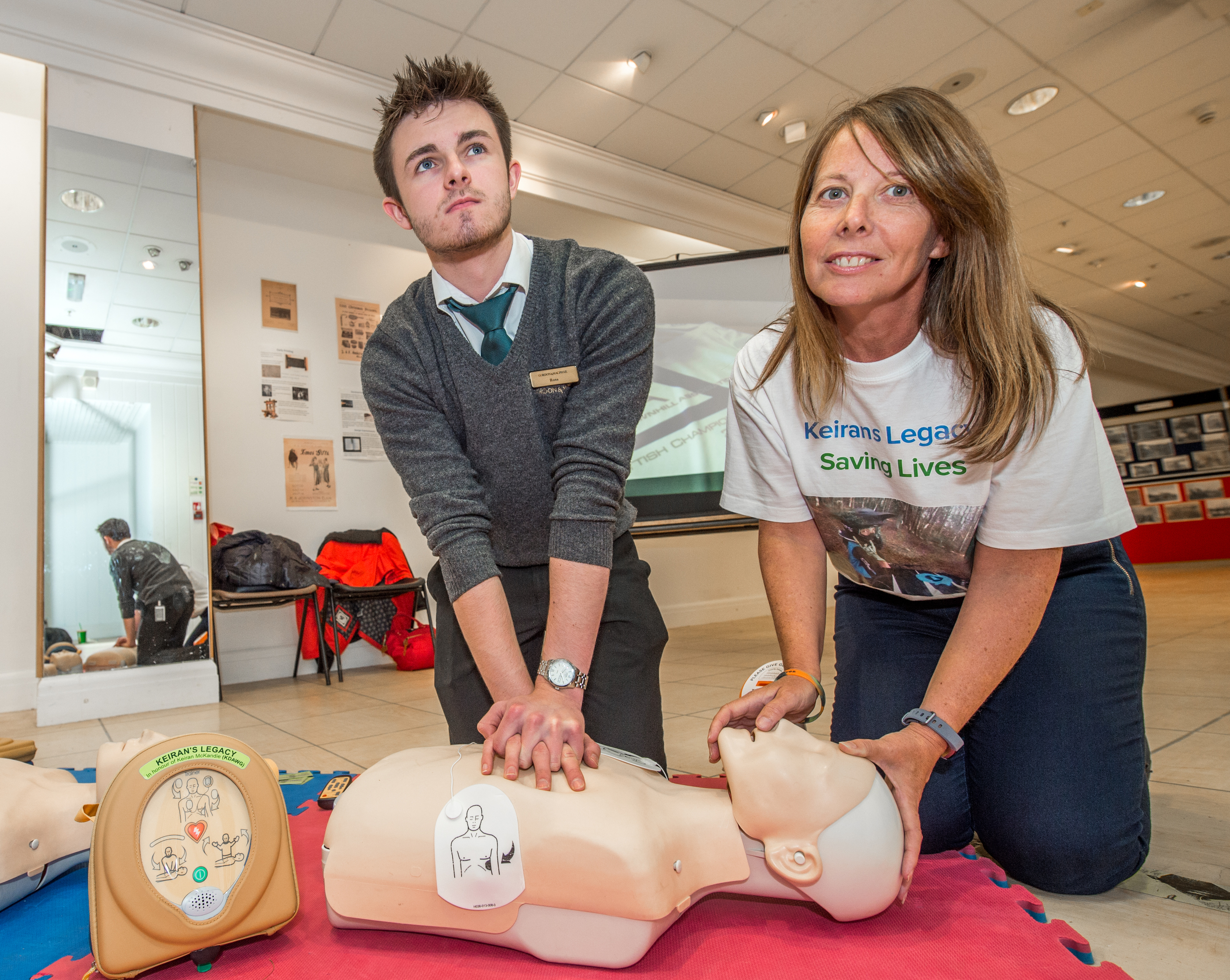 CPR training taking place at St Giles shopping centre with Sandra MacKandie alongside Keiran's childhood friend Ross Clarke.