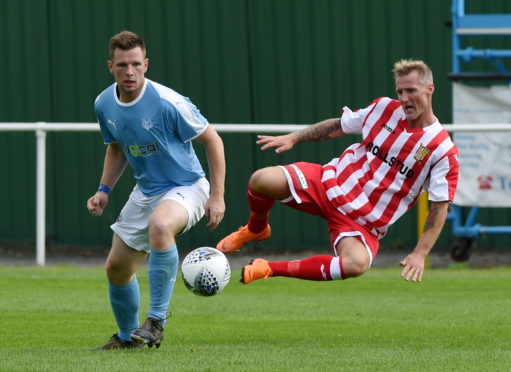 Glenn Main (left) made his 400th appearance for Nairn last weekend.