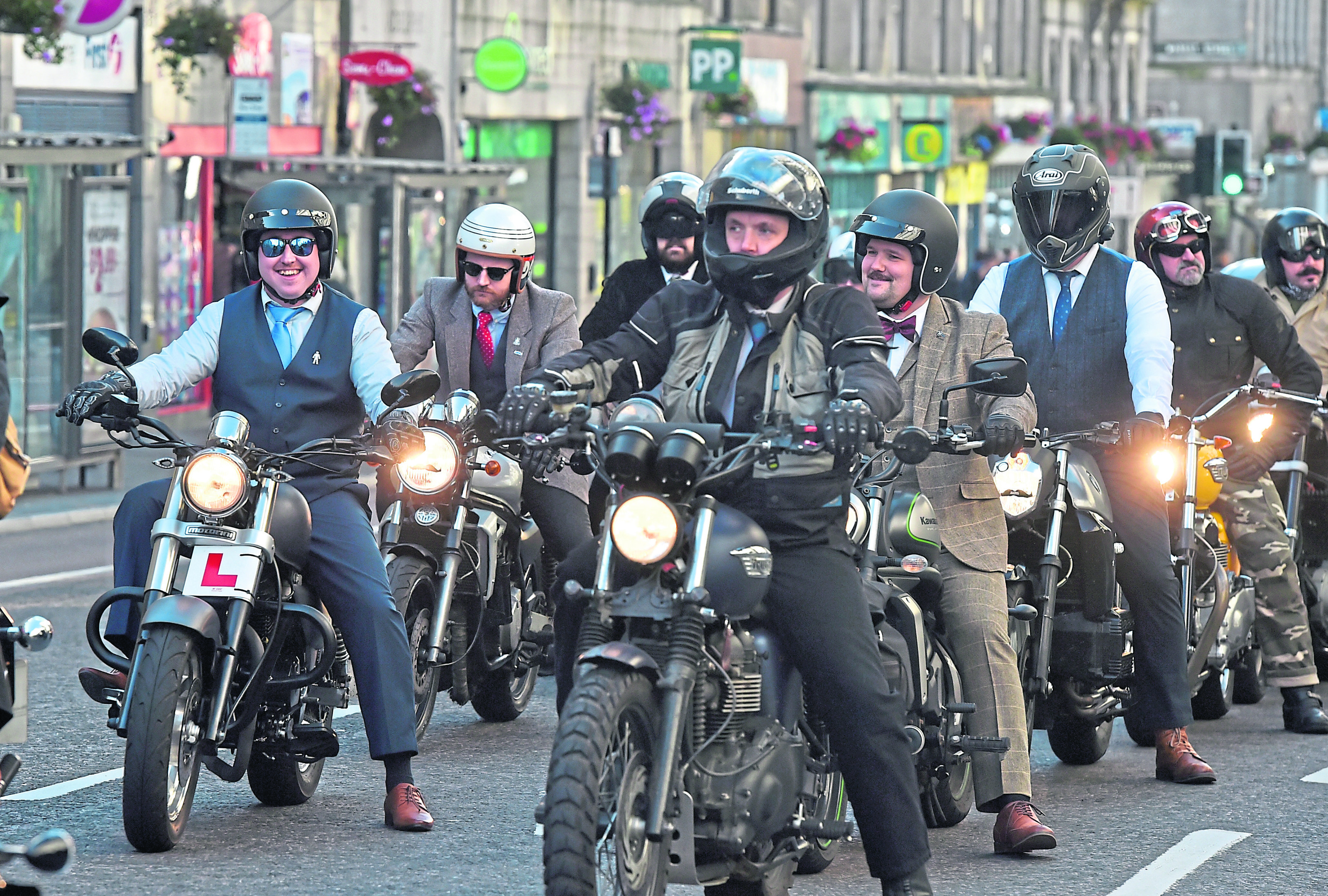 Bikers in suits rode through Aberdeen to raise awareness of prostate cancer.