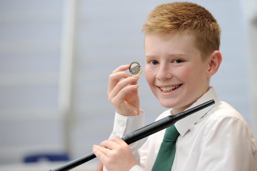 Joe MacPherson of Fife, winner of the Chanter competition playing a Gaelic Air in the under 13 age group despite hurting his shoulder recently while playing badminton.