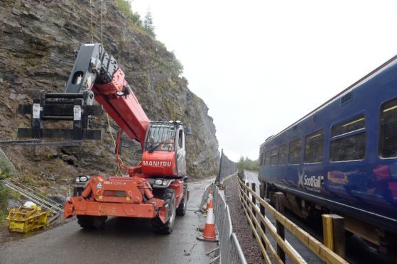 A train passing the A890 Stromeferry bypass works. Picture by Sandy McCook