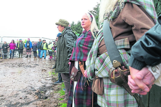 Protesters linked hands around the perimeter fence of the development. Picture by Andrew Smith