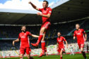 Andy Considine celebrates his winner against Celtic in May 2018. Image: SNS.