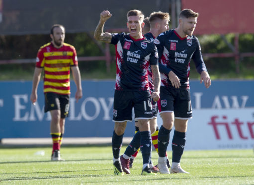 Josh Mullin celebrates opening the scoring for Ross County.