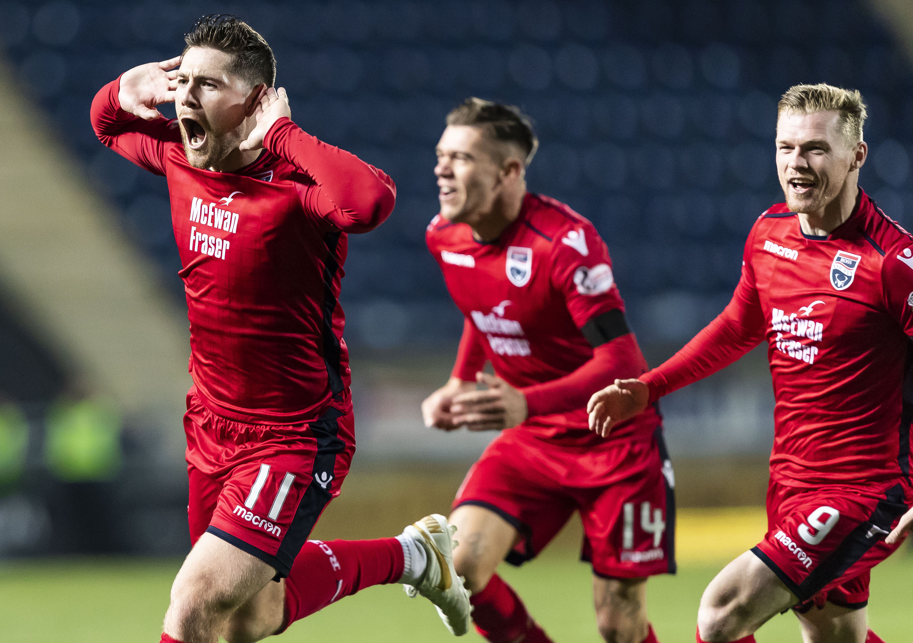 Iain Vigurs celebrates levelling the scores for Ross County.