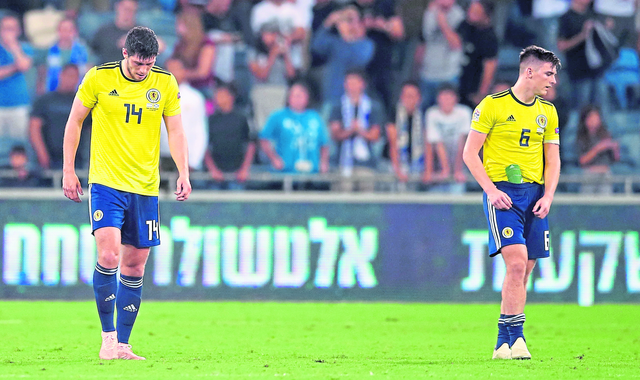 Scotland's Scott McKenna (left) and Kieran Tierney appear dejected during the UEFA Nations League Group C1 match.