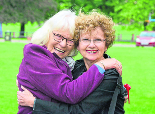 Lynn Lonnkvist (right) met half-sister Anderine Drysdale for the first time at the house where she was born in Alva.