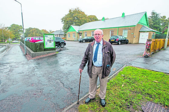 Community Councillor, David McGrath pictured outside Smithton Community Hall.