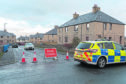 Thurso's Holborn Avenue, was sealed off all day following the death of a man in a house on the street.