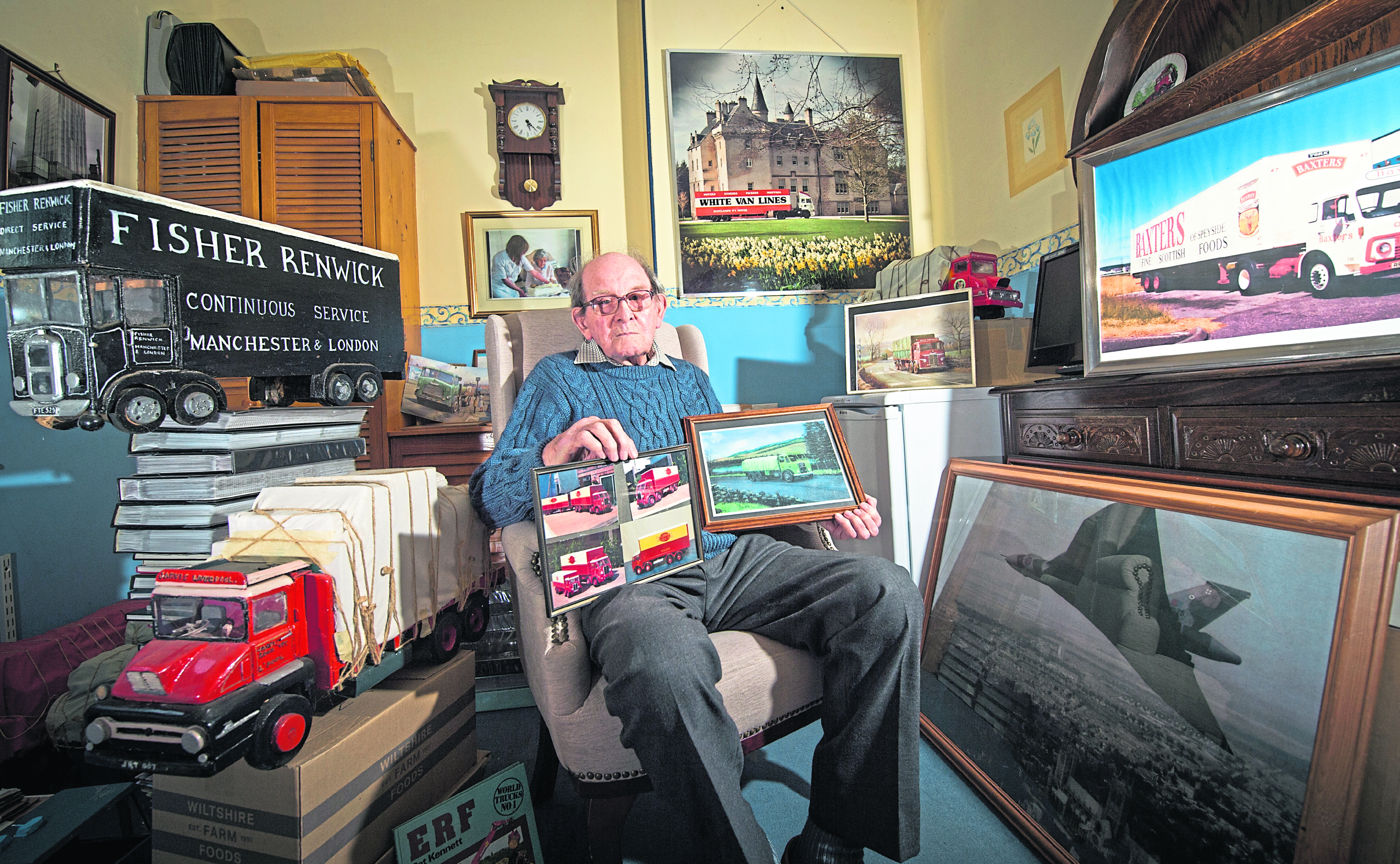 Retired lorry driver, Bill Heaton at home in Brodie with some of collection of memorabilia. Picture by Jason Hedges.