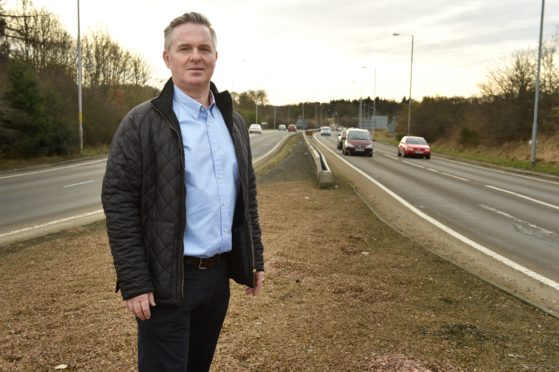 Colin Clark MP has called for the A96 to be dualled along the existing route.