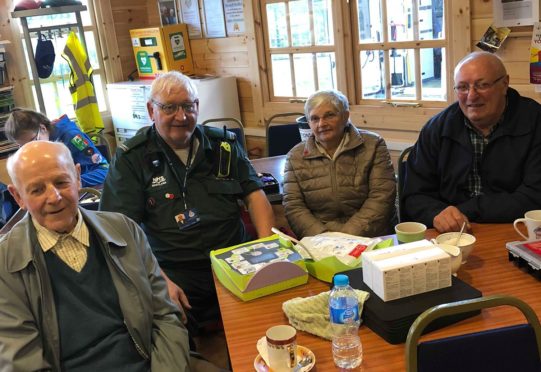 Some of the group who took part in Saturday's Restart a Heart day at the cabin at Aden Allotments.