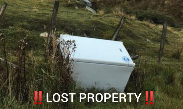 The fridge left by the roadside.