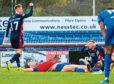 Ross County's Billy McKay (far right) celebrates Ross County's equaliser.