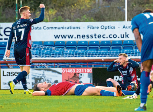 Ross County's Billy McKay (far right) celebrates Ross County's equaliser.