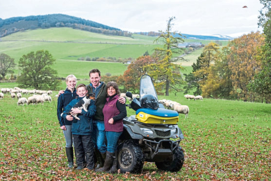 Neil and Debbie McGowan on their farm Incheoch near Alyth with children Tally and Angus.