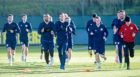 Captain Andy Robertson, centre, leads the Scotland squad during training in Edinburgh yesterday ahead of a crucial Nations League double-header against Israel and Albania.