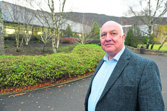 Councillor Bill Lobban outside the Macdonald Resort swimming pool in Aviemore.