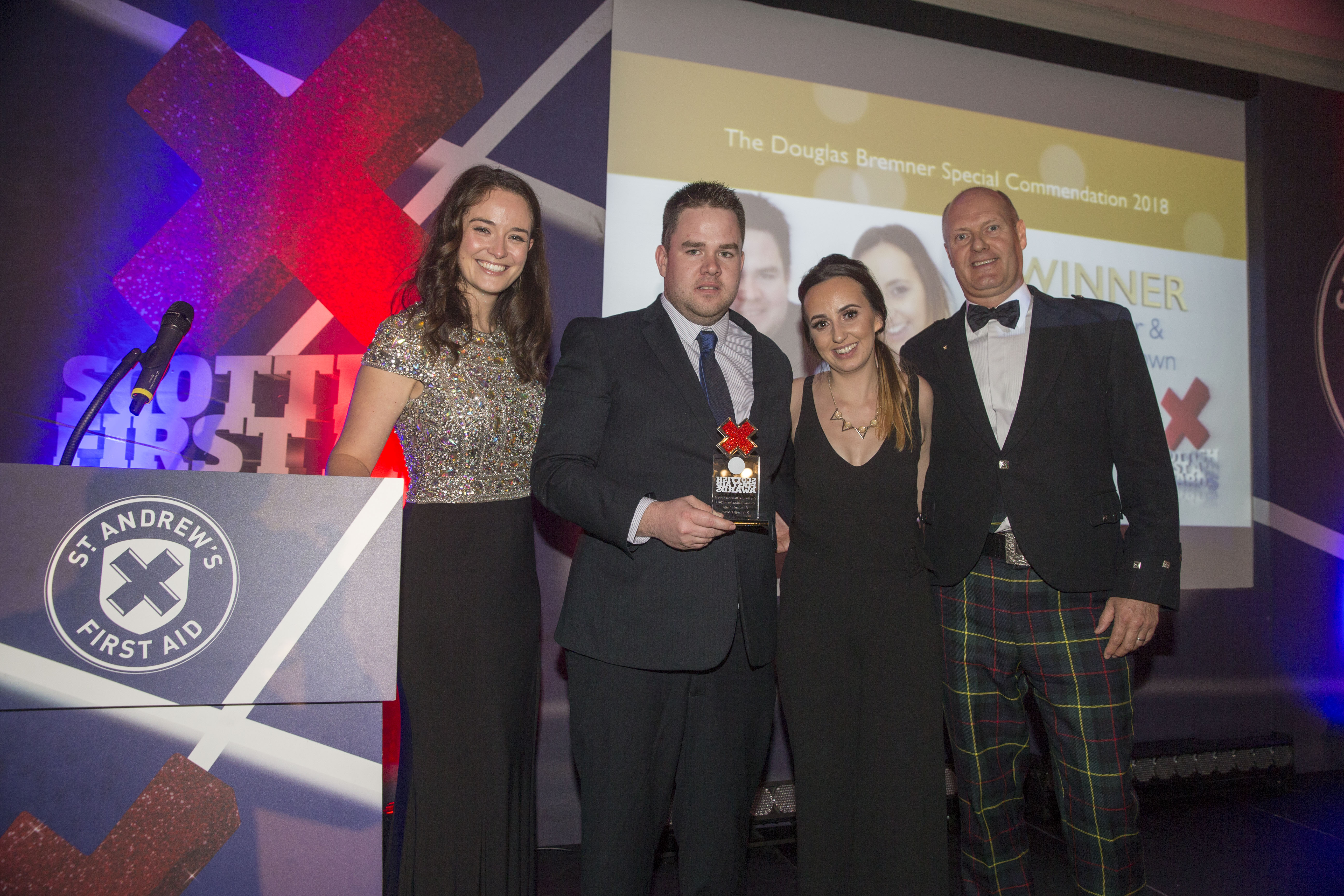 Alec and Kayleigh Brown with former STV presenter and ex-Miss Scotland Jennifer Reoch (left) and Stuart Callison, chief executive of St Andrew's First Aid