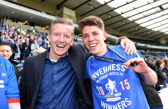 Father and son Charlie and Ryan Christie celebrate after Caley Thistle's cup final win in 2015.