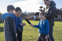 Charlie Kennedy interviews his classmates at Aberlour Primary School.