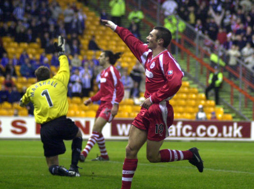 Darren Young had eight years with Aberdeen and is a former club captain.
