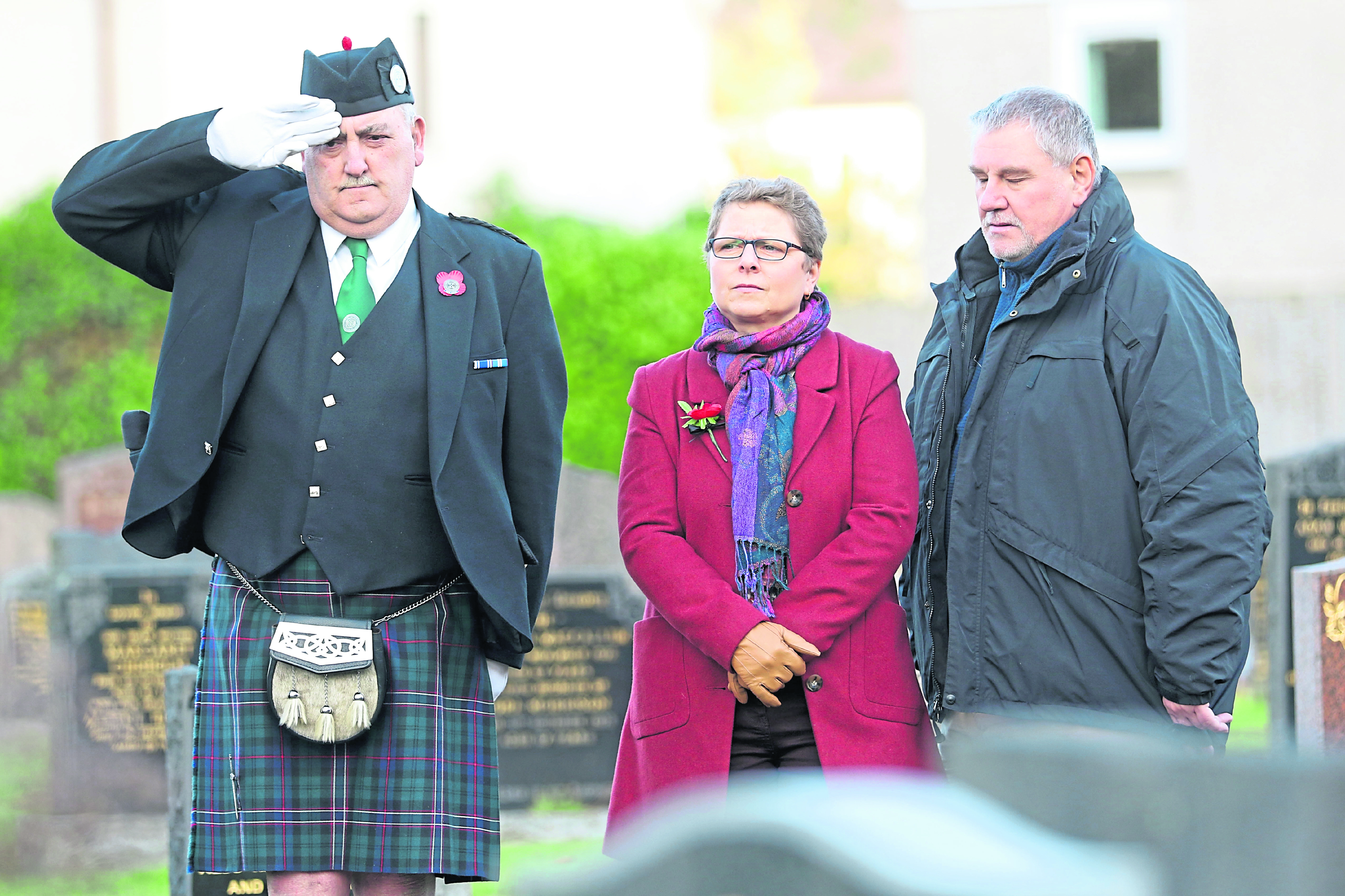 A commemorative ceremony was held at Retired police officer Dave Conner, who organised the ceremony, with Avril Lumsden and Ronald Lumsden, daughter and son of David Lumsden. Ronald is also a retired police officer. Picture: Andrew Smith