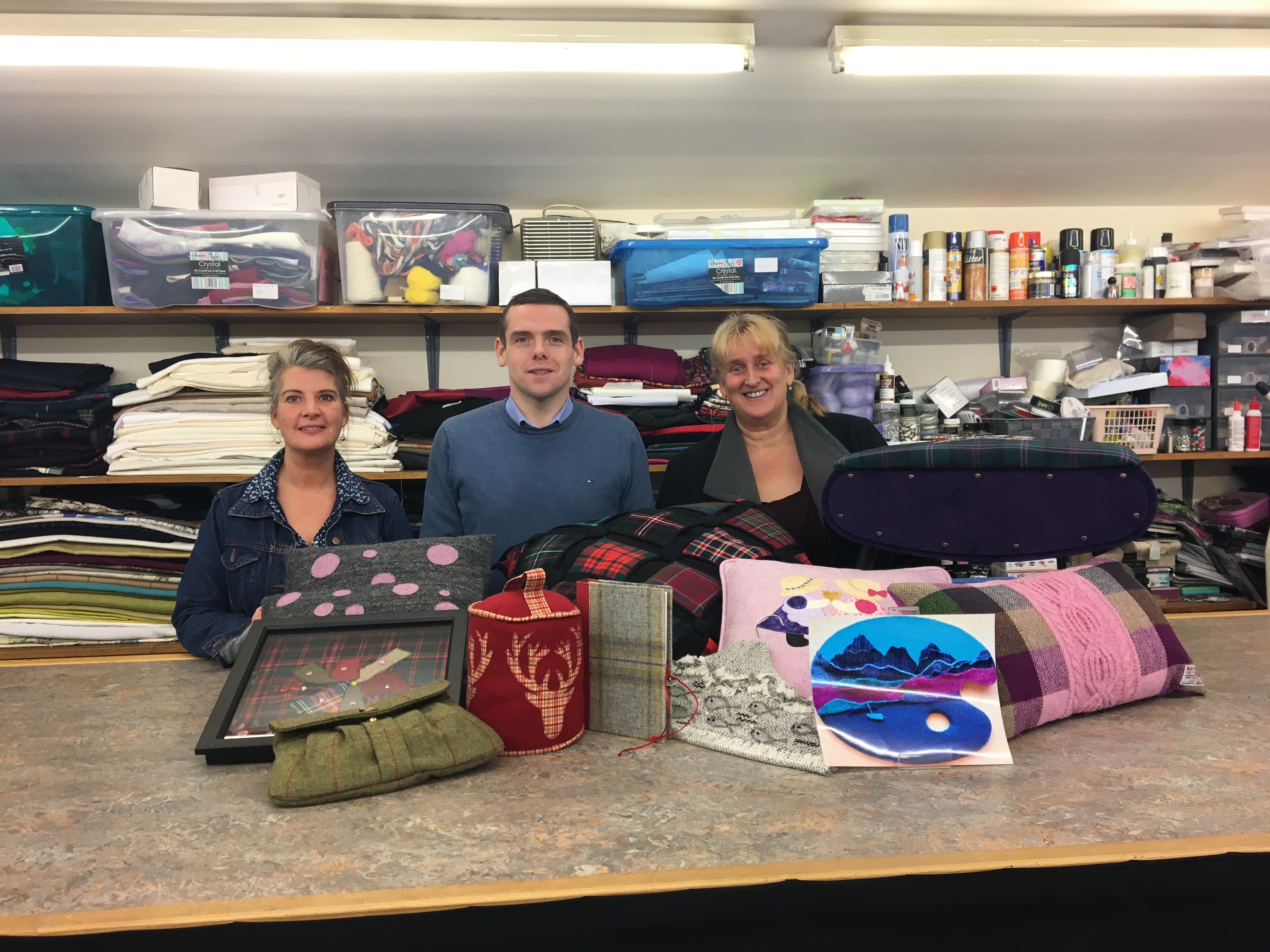 Douglas Ross with judges (from left)  Linda Stuart from Keith and Elaine Bruce from Eden Watermill, looking at the entries for the competition at the Keith Kilt