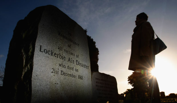 LOCKERBIE, UNITED KINGDOM - DECEMBER 17:  (FILE PHOTO) A member of the public visits the Lockerbie Memorial on December 17, 2008 in Lockerbie, southern Scotland. Convicted terrorist Abdelbaset ali al-Megrahi, has been serving a life sentence for the 1988 Pan-AM flight 103 Lockerbie bombing, which killed 270 people. Megrahi, who is terminally ill with prostate cancer has served eight years of a life sentence, and following the decision today, August 20, 2009 has been released on compassionate grounds to go home to spend his remaining days with his family in Libya. (Photo by Jeff J Mitchell/Getty Images)