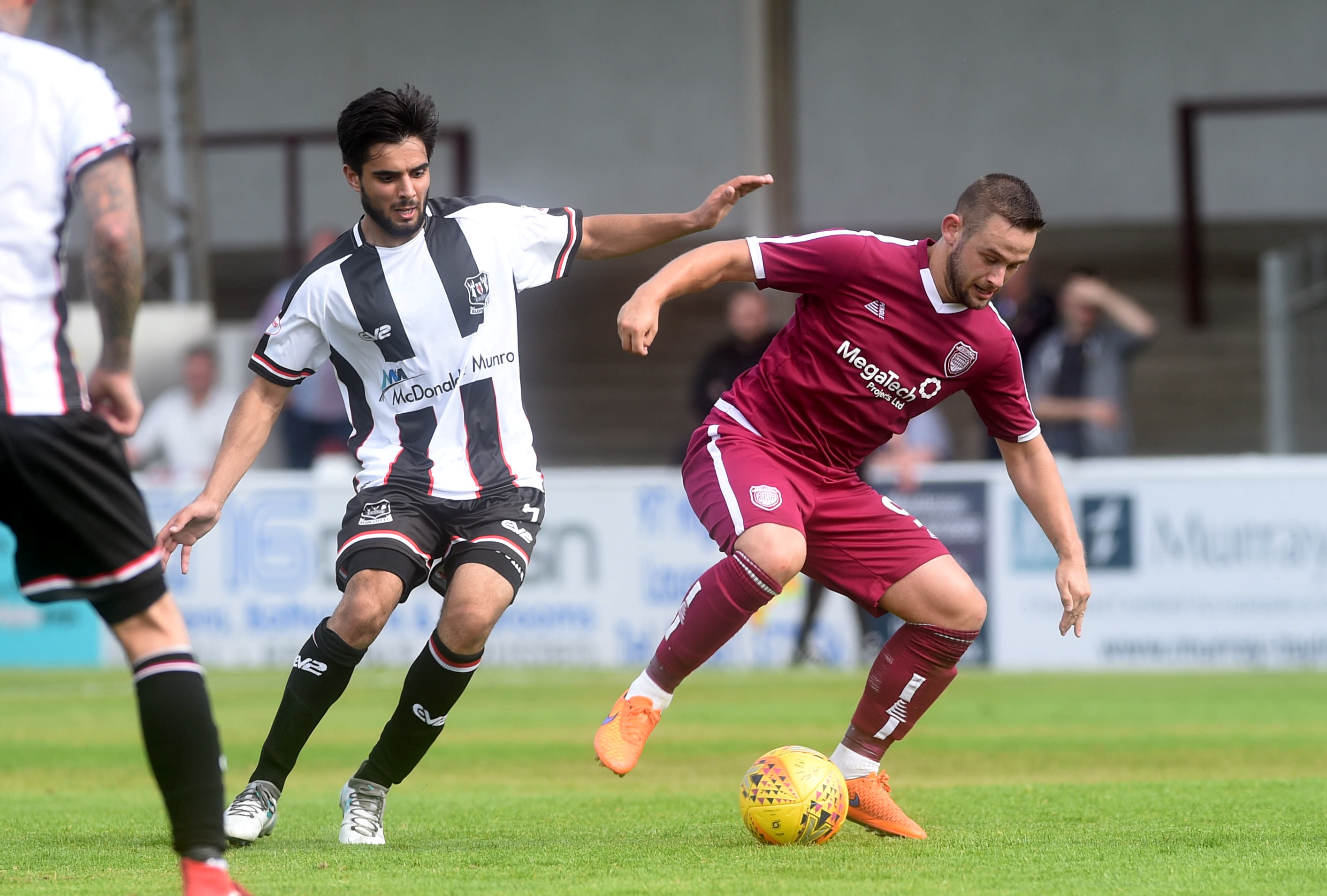 Betfred Cup
Arbroath v Elgin City
Gayfield Park, Arbroath
Pictured are Elgin's Rabin Omar and Arbroath's Ryan Wallace
Picture by DARRELL BENNS    
Pictured on 21/07/2018