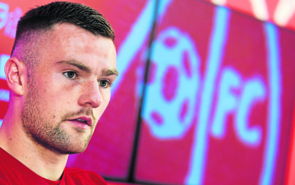 Aberdeen defender Mikey Devlin.