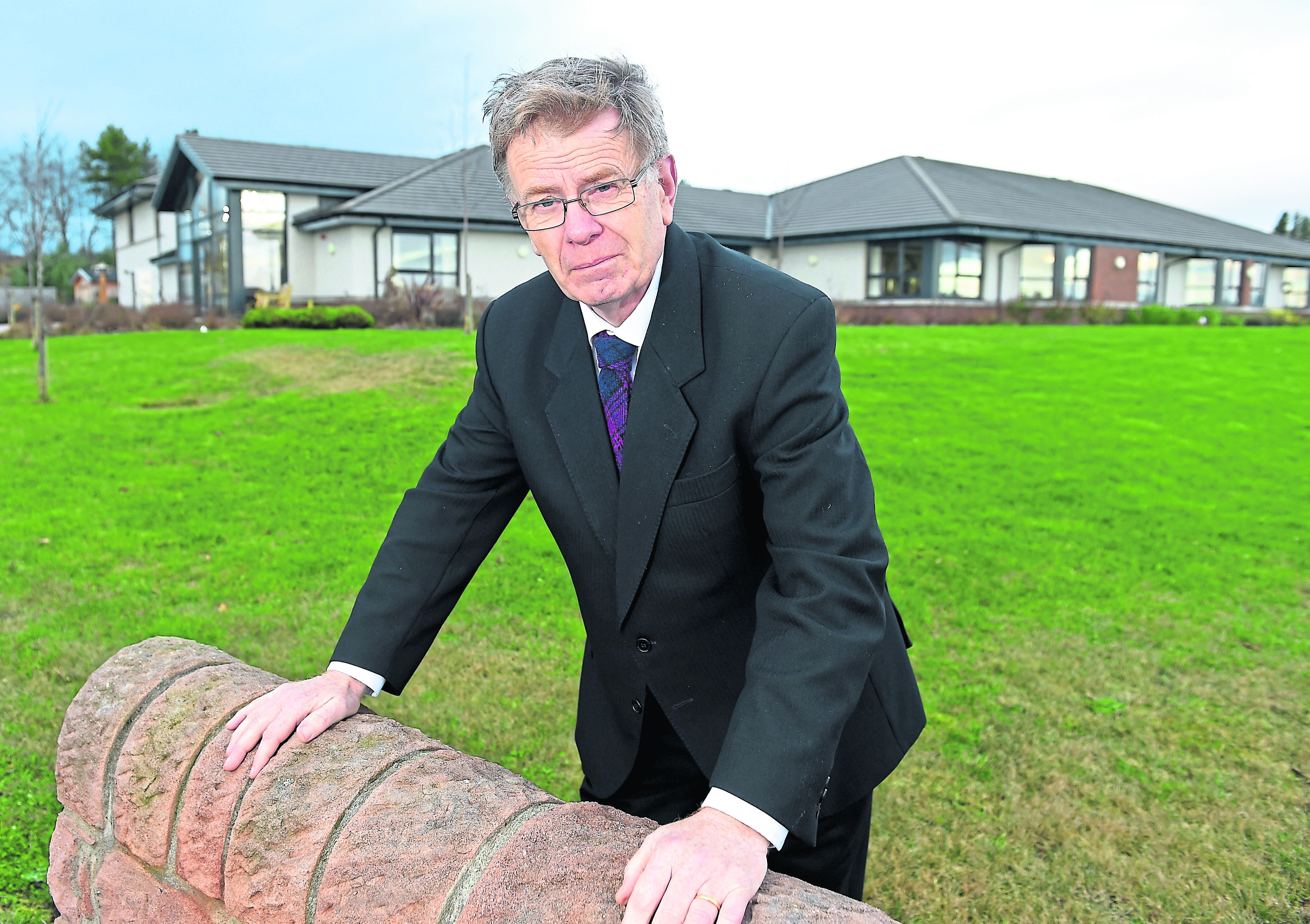Highland Councillor Alasdair Rhind outside the Innis Mhor care home in Tain.