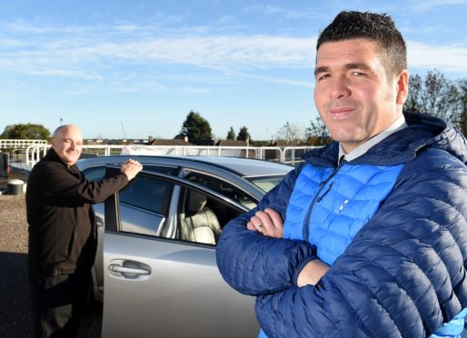 Picture by SANDY McCOOK    2nd November '18
Military veteran and Inverness taxi Driver Tommy Crighton (right) photographed in Inverness on Friday with David Gibson, founder of Fares4Free.