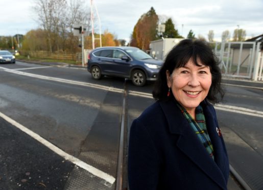 Highland Councillor Margaret Paterson with the now completed Dingwall Middle crossing.