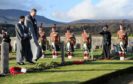 A service of Commemoration and Remembrance was held in Kingussie Cemetery for nine members of the Royal Indian Army Service Corps who in during training during the Second Word War.   A bugler plays the Last Post. Picture by Sandy McCook