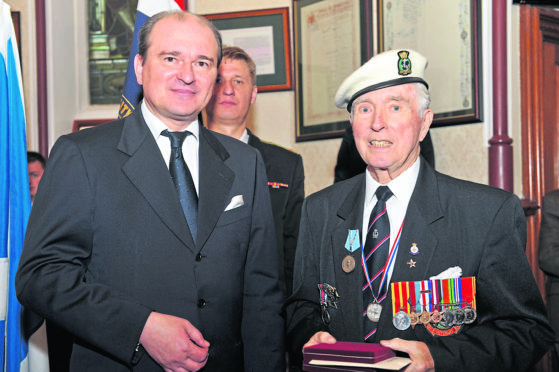 Presentation of the Ushakov Medals to veterans of the Arctic Convoys of WW2 at the Town House, Inverness.