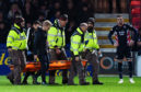 Liam Fontaine was stretchered off against Dundee United.