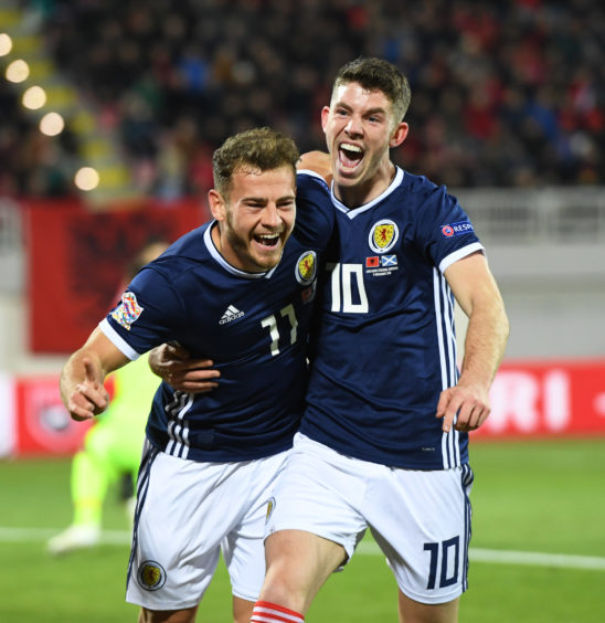 Ryan Fraser (L) and Ryan Christie in action for Scotland.