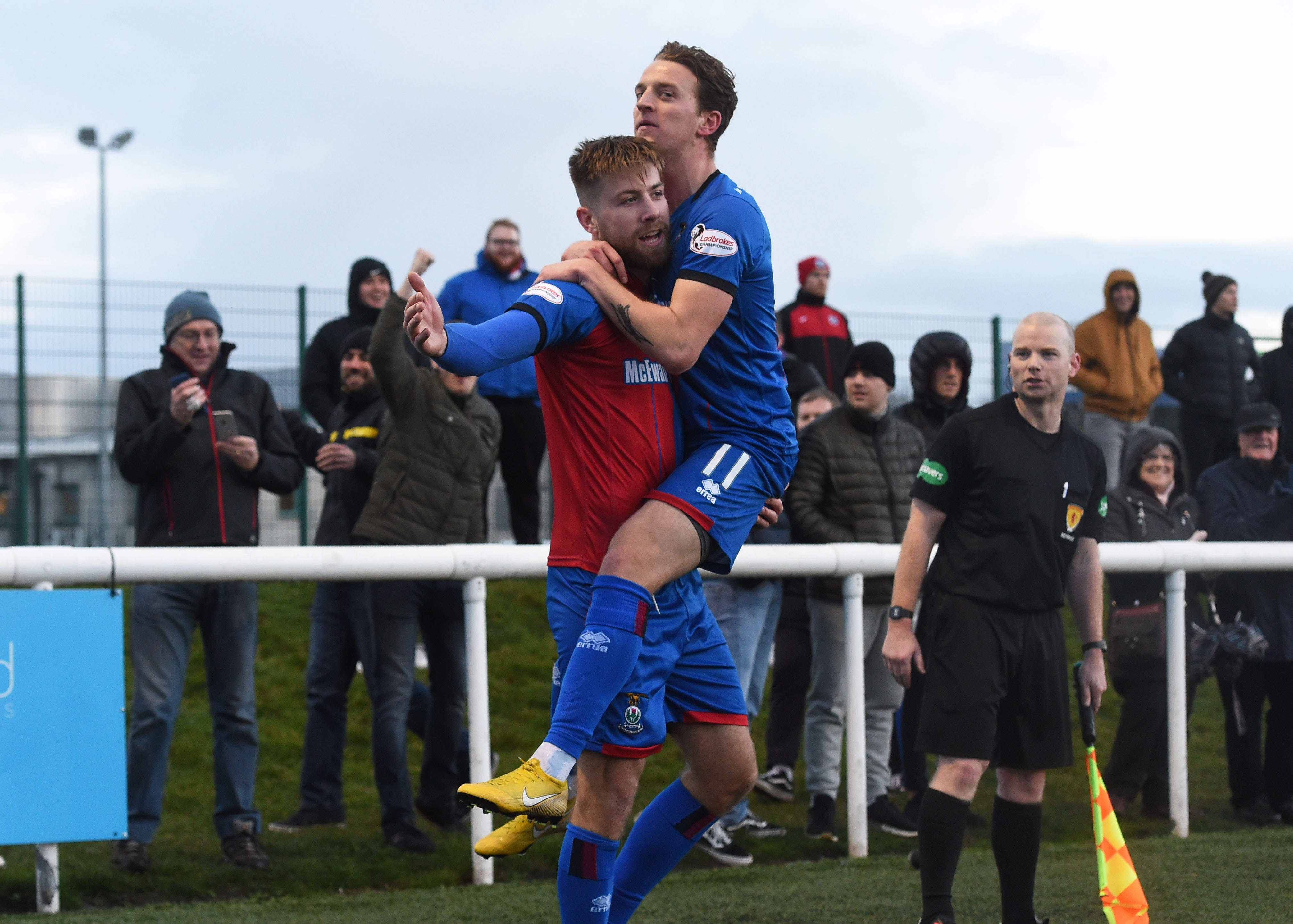 Shaun Rooney (left) celebrates his goal with Tom Walsh