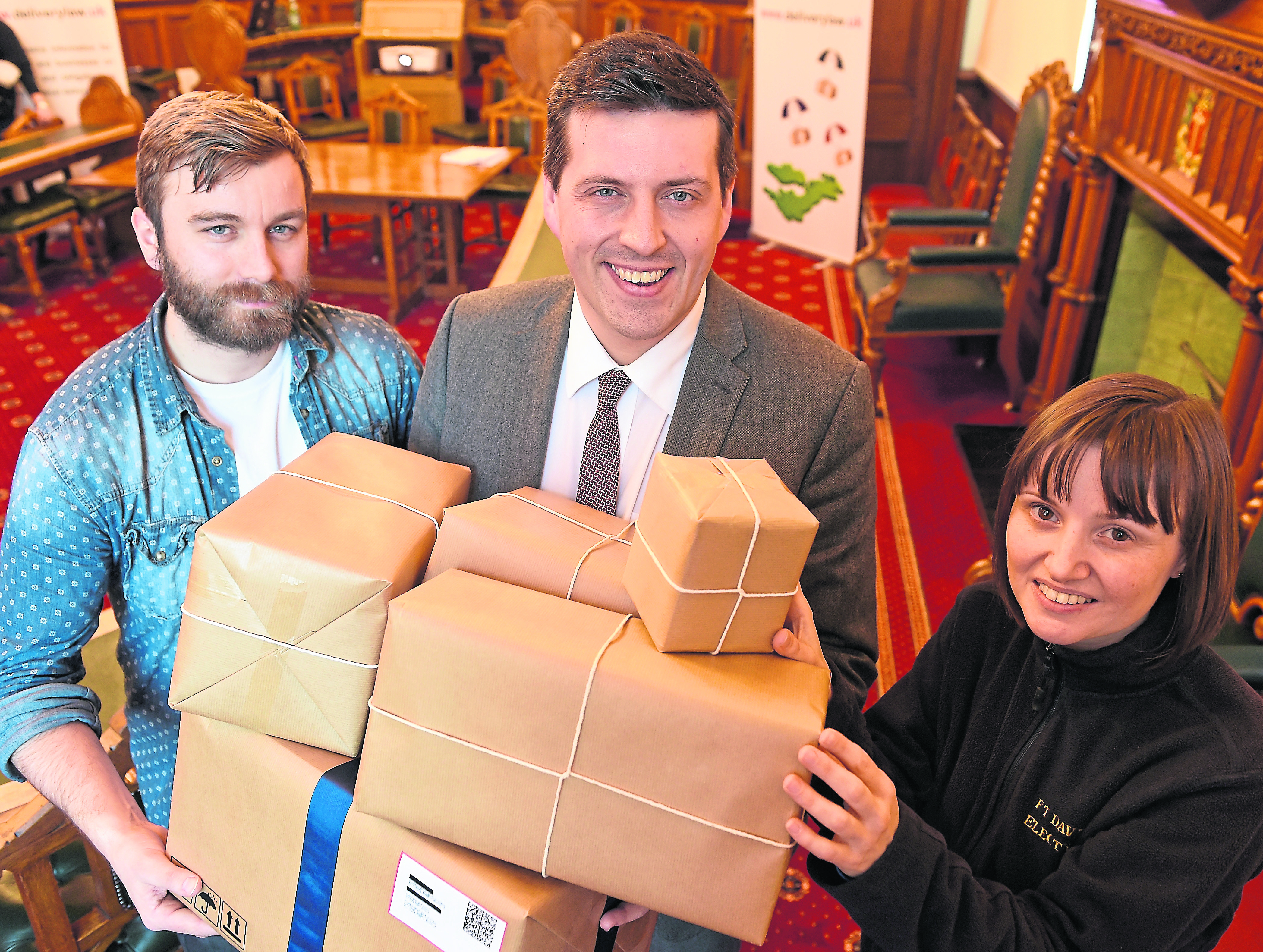Jamie Hepburn (centre) in Inverness yesterday for the launch of the National Fair Delivery Day Action Plan.