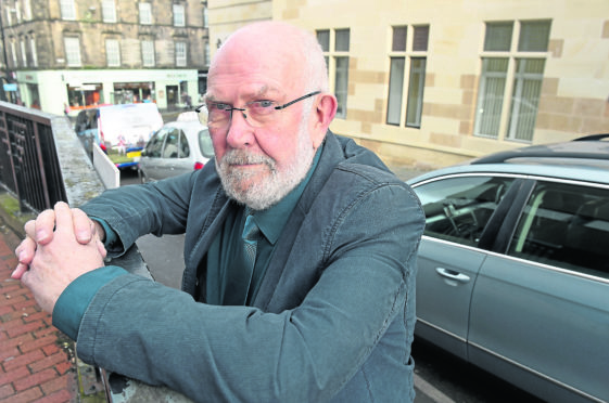 Inverness Taxi Alliance chairman Andrew MacDonald at Castle Wynd. Picture by Sandy McCook.