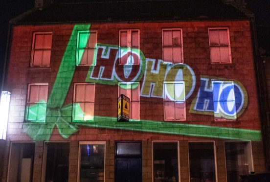 Christmas animation on Wiseman’s building on Broad Street, Peterhead by Double Take Projections.

Picture by Abermedia / Michal Wachucik