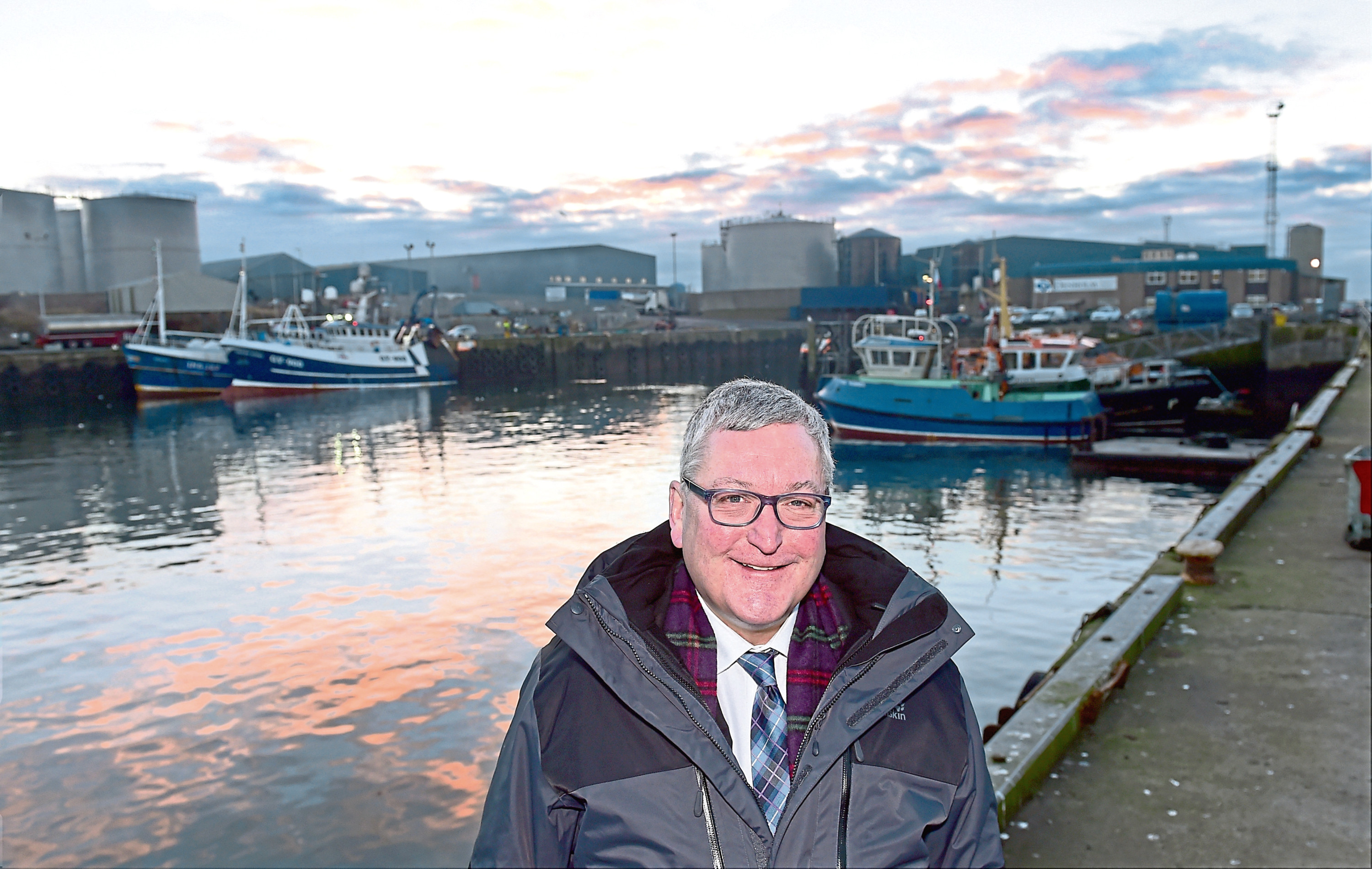 Fisheries Minister Fergus Ewing visited Peterhead Harbour to hear details of the planned expansion of Europe's biggest fishing port.