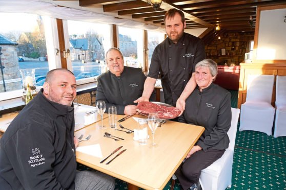 Coach House Dornoch 
Neil Boyle, Bank of Scotland with Tommy, Audrey and Kenny Mackay.