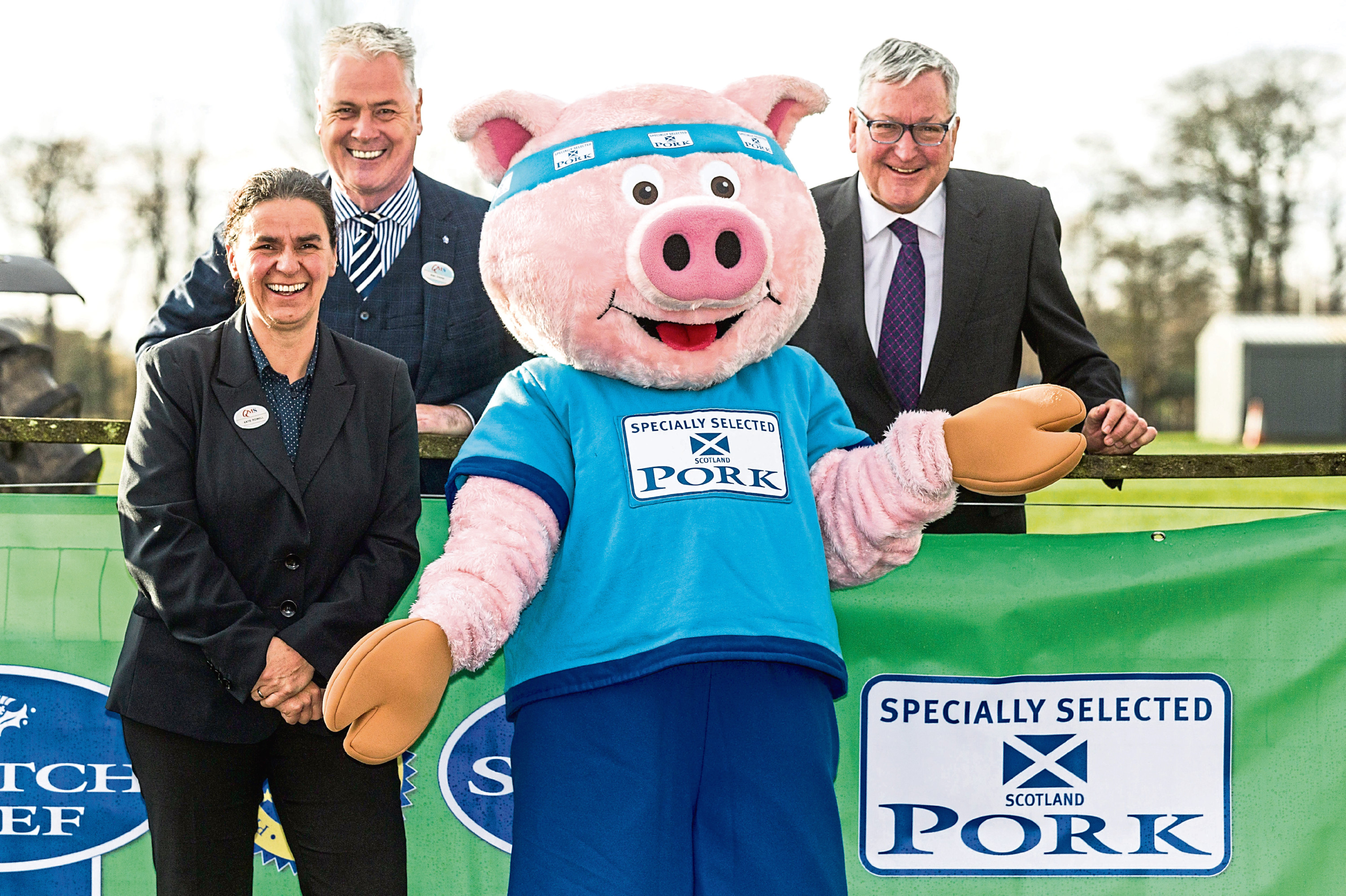 From left -QMS chairman Kate Rowell, QMS chief executive Alan Clarke, the Specially Selected Pork mascot and Rural Economy Secretary Fergus Ewing.