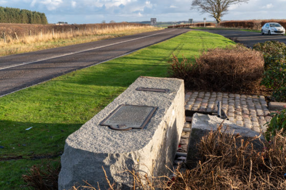 The damaged WWII RAF Banff Strike Wing Memorial at Boyndie, between Portsoy and Banff.