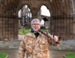 Alistair McPherson outside Elgin Cathedral.