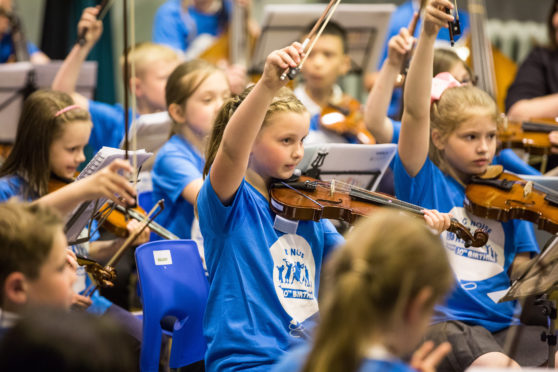 Youngsters taking part in a Big Noise Torry performance